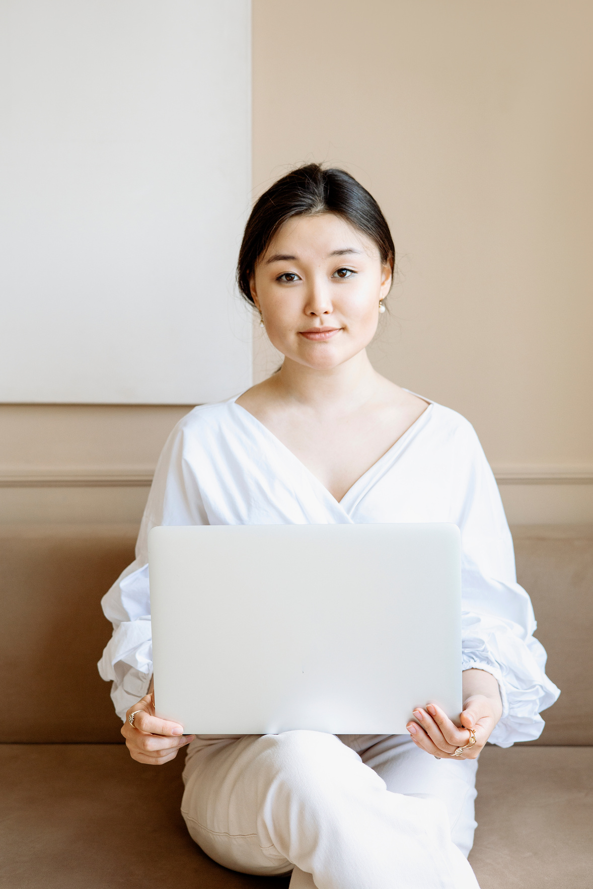A Businesswoman Holding a Laptop